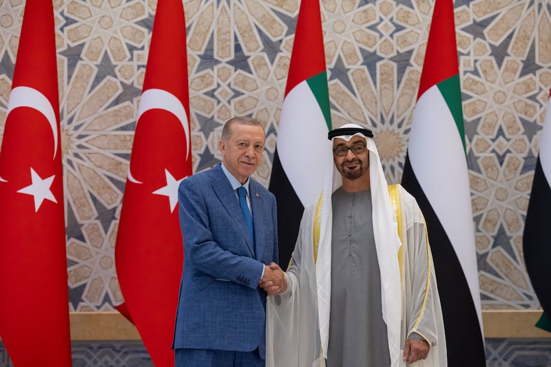 President Sheikh Mohamed shakes hands with Mr Erdogan. Photo: UAE Presidential Court