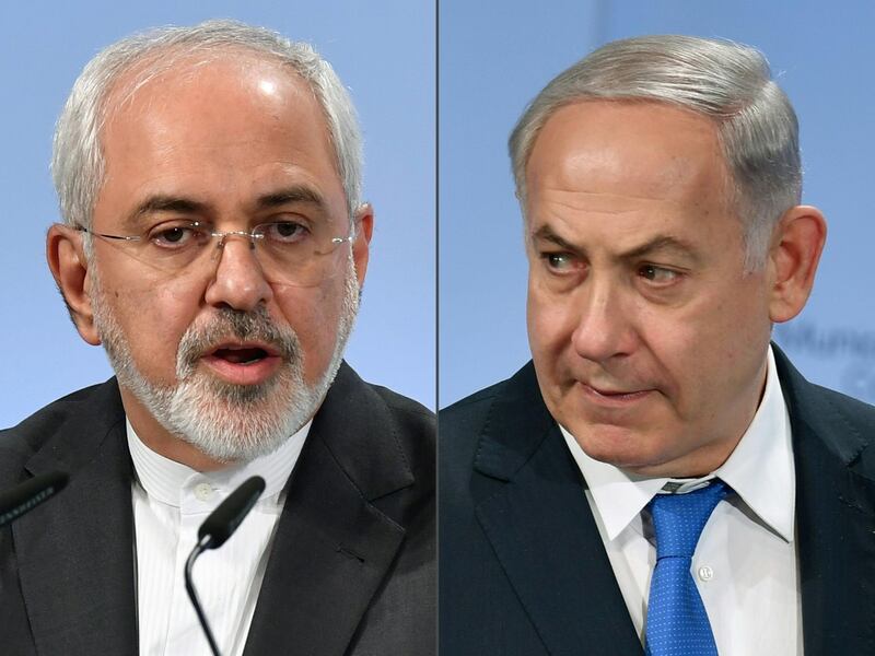 (COMBO) This combination of pictures created on February 18, 2018 shows Iranian Foreign Minister Mohammad Javad Zarif (L) and Israeli Prime Minister Benjamin Netanyahu (R) as they attend the Munich Security Conference on February 18, 2018 in Munich, southern Germany.
Netanyahu warned Tehran over aggressions by what he called Iran and its "proxies" in Syria, while showing what he claimed was a piece of an Iranian drone shot down in Israeli airspace. / AFP PHOTO / Thomas KIENZLE