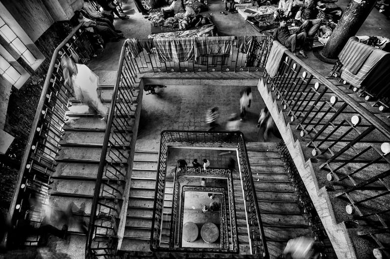 Stairs leading to the floors of the six-storey hospital building. Most patients, attendants, doctors, interns and medical students have to use these stairs, as the huge crowds simply outnumber the elevators. Photo: Ibrahim Iqbal/ Xposure Photo Festival