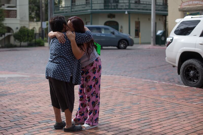 Maria Isabel Renteria embraces her mother whom she had not seen in almost two years near the Gateway to the Americas border crossing in Laredo, Texas. Reuters