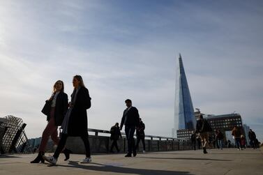 Commuters walk along London Bridge in the UK. The monthly index of demand for workers from accountancy firm KPMG and the Recruitment and Employment Confederation (REC) rose to its highest level in just over 23 years in April. Bloomberg