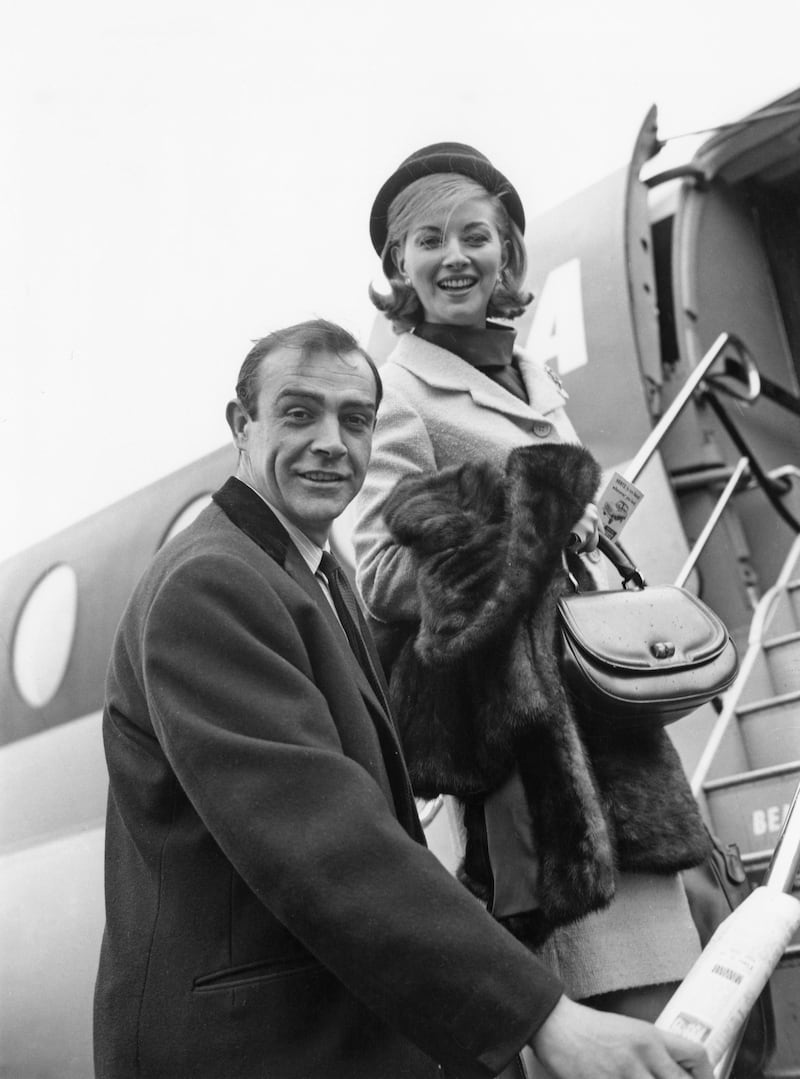 Actors Sean Connery and Daniela Bianchi, stars of the James Bond film 'From Russia With Love', leaving London for location filming in Istanbul, 20th April 1963. (Photo by Keystone/Hulton Archive/Getty Images)