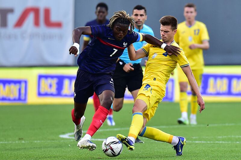 Benoit Badiashile of France fights for the ball with Ukraine's Mykola Mykhailenko in a European Under-21 Championship qualifier. AFP