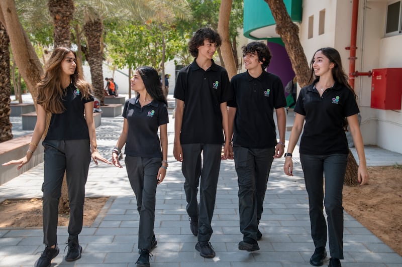 Pupils walking on the campus at Jumeira Baccalaureate School.