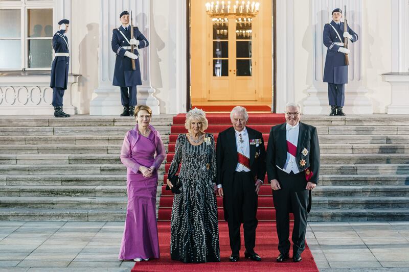 King Charles, Camilla, Mr Steinmeier and his wife, Ms Buedenbender arrive for a dinner at presidential palace Schloss Bellevue in Berlin. EPA