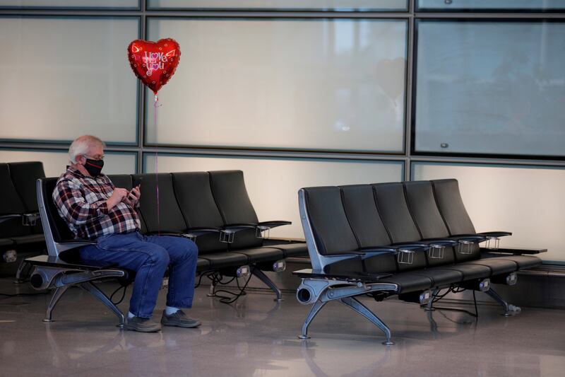 Paul Campbell waits for his fiancee Patricia Bittag to arrive on a flight from Amsterdam at Logan International Airport. The pair had been separated for 23 months. Reuters