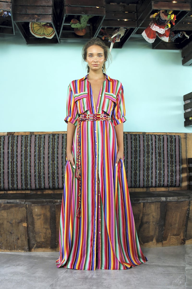 A traditional Mexican striped pattern covers this versatile shirt-dress, which can be worn open or closed