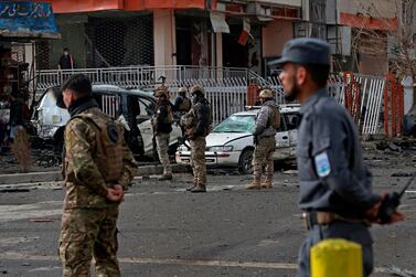 Afghan security forces guard the site of a bombing in Kabul on December 20, 2020, one of a series of assassination attempts on prominent Afghans in recent weeks. AFP