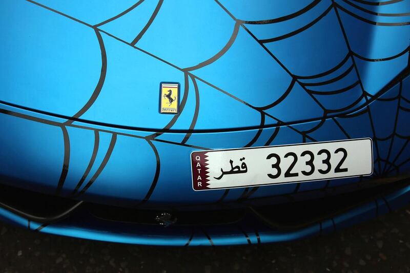 A blue Ferrari 456 Italia with Qatari licence plates. Dan Kitwood / Getty Images