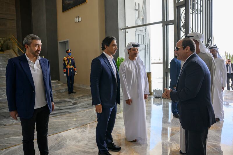 Sheikh Abdullah, Sheikh Mansour and Sheikh Hazza greet Mr El Sisi before a meeting. Hamad Al Kaabi / UAE Presidential Court



