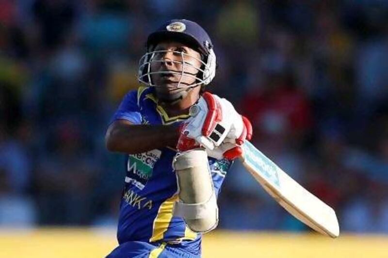 Mahela Jayawardene scored 85 runs in Sri Lanka’s win over Australia to put them top of the table.