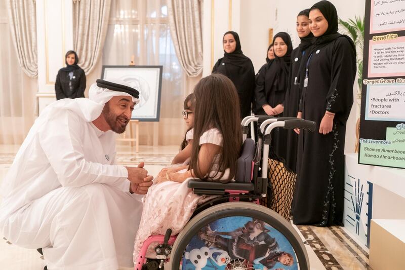 ABU DHABI, UNITED ARAB EMIRATES - October 23, 2018: HH Sheikh Mohamed bin Zayed Al Nahyan Crown Prince of Abu Dhabi Deputy Supreme Commander of the UAE Armed Forces (L), views the projects of the winners of The National Science, Technology and Innovation Festival, during a Sea Palace barza. 

(Rashed Al Mansoori / Crown Prince Court - Abu Dhabi )
---