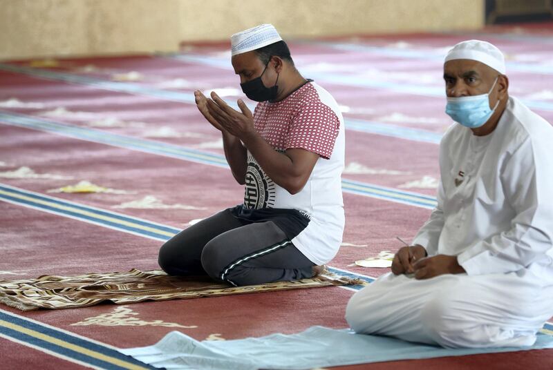 Dubai, United Arab Emirates - December 03, 2020: People pray at Al Farooq Omar Bin Al Khattab Mosque. Thursday, December 3rd, 2020 in Dubai. Chris Whiteoak / The National