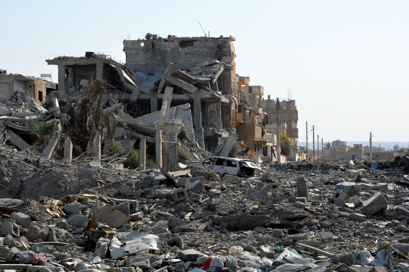 epa06284535 Damaged buildings are seen after fighters from Syrian Democratic Forces (SDF) took control of Raqqa, Syria, 22 October 2017 (issued 23 October 2017). Media reports on 22 October said Russia accused the coalition of heavily bombing Raqqa in the fight against the IS. The US-backed Syrian Democratic Forces announced on 18 October they have seized the majority of the Syrian northeastern city of al-Raqqa concluding a campaign that began on 06 June to liberate the city, former capital of the caliphate self-proclaimed by the IS terror organization in 2014.  EPA/YOUSSEF RABIH YOUSSEF