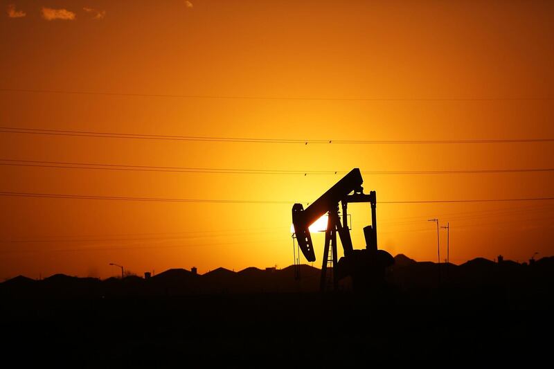 MIDLAND, TX - JANUARY 20: A pumpjack   sits on the outskirts of town at dawn in the Permian Basin oil field on January 21, 2016 in the oil town of Midland, Texas. Despite recent drops in the price of oil, many residents of Andrews, and similar towns across the Permian, are trying to take the long view and stay optimistic. The Dow Jones industrial average plunged 540 points on Wednesday after crude oil plummeted another 7% and crashed below $27 a barrel.  (Photo by Spencer Platt/Getty Images)