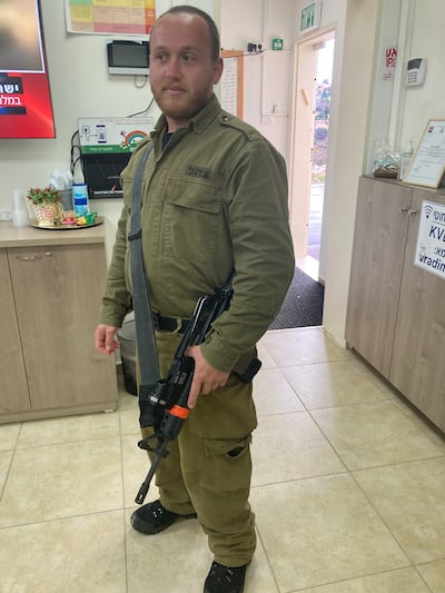A civilian member of Israel's Rapid Response Force in the town of Kfar Vradim, northern Israel.