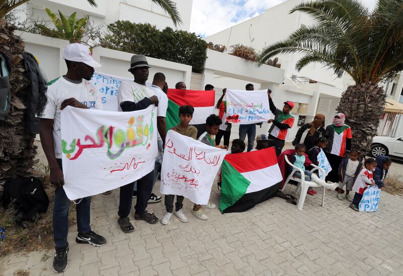 Sudanese call for the end of the war as they protest in front of their country's embassy in Tunis, Tunisia. EPA