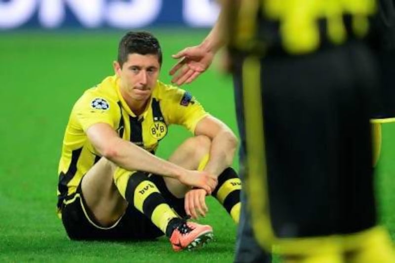 Borussia Dortmund striker Robert Lewandowski reacts after his team lost the Uefa Champions League final to Bayern Munich at Wembley Stadium. Patrik Stollarz / AFP