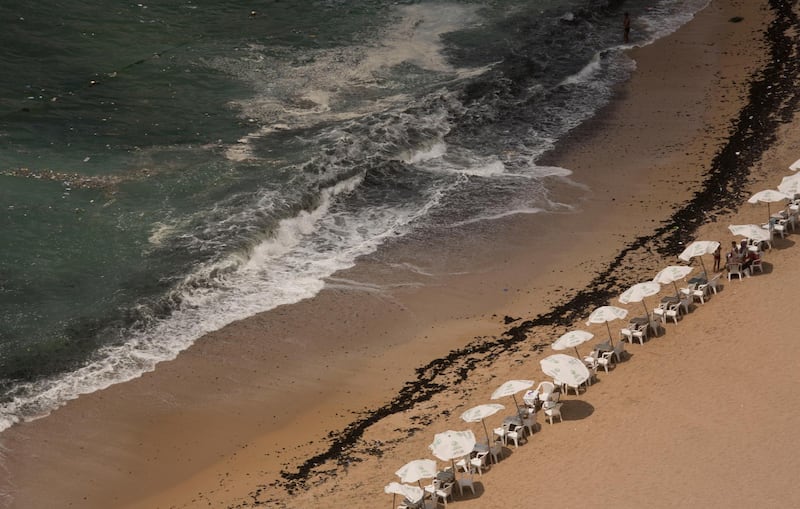 Refuse creeps towards the shore at Stanley Beach in Alexandria, Egypt. AP