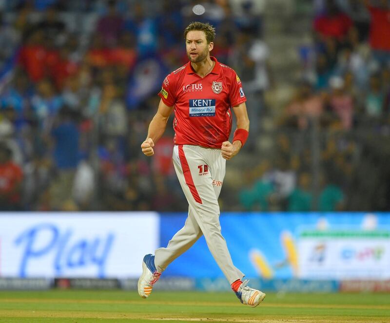 Kings XI Punjab cricketer AJ Tye celebrates after taking the wicket of Mumbai Indians cricketer Evin Lewis during the 2018 Indian Premier League (IPL) Twenty20 cricket match between Mumbai Indians and Kings XI Punjab at the Wankhede Stadium in Mumbai on May 16, 2018. / AFP PHOTO / INDRANIL MUKHERJEE / ----IMAGE RESTRICTED TO EDITORIAL USE - STRICTLY NO COMMERCIAL USE----- / GETTYOUT