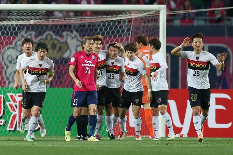 Pohang Steelers react after a goal against Cerezo Osaka of Japan during Asian Champions League group play. Jiji Press / AFP