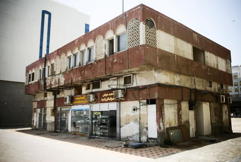 There were once more than a dozen of this type of mixed-use building in Abu Dhabi. Despite being occupied, this example on Airport Road was identified as an abandoned building in 2015 and was finally demolished earlier this year. Lee Hoagland / The National