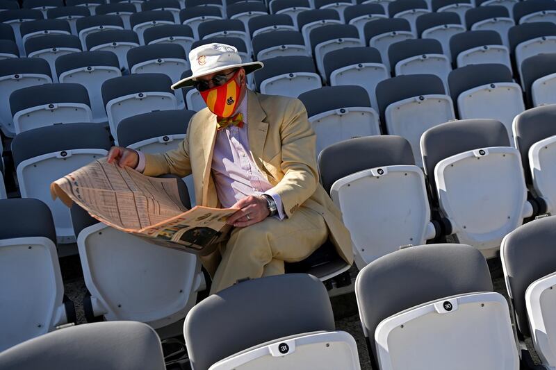 LONDON, ENGLAND - JUNE 02: A MCC Member is seen wearing a protective mask inside the ground prior to Day 1 of the First LV= Insurance Test Match between England and New Zealand at Lord's Cricket Ground on June 02, 2021 in London, England. (Photo by Shaun Botterill/Getty Images)