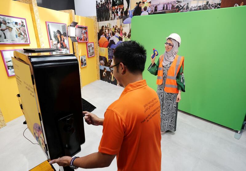 Dubai, United Arab Emirates - July 22, 2019: People get a souvenir photo from the visitor centre. Expo 2020 Dubai Open Doors. A sneak peek of the worldÕs greatest show now. Monday the 22nd of July 2019. Expo 2020 site, Dubai. Chris Whiteoak / The National