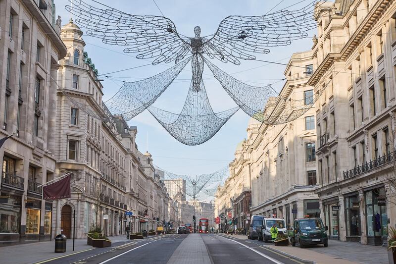 Christmas decorations remain hanging over an empty Regents Street in London. Getty Images