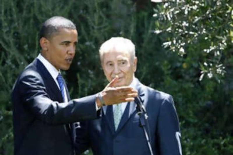 Israel's president Shimon Peres and the US Democratic presidential candidate Barack Obama  deliver joint statements to the media in Jerusalem.