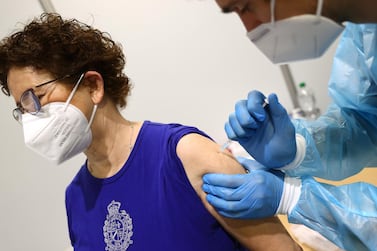 A woman receives AstraZeneca’s Covid-19 vaccine in Hagen, Germany. Reuters