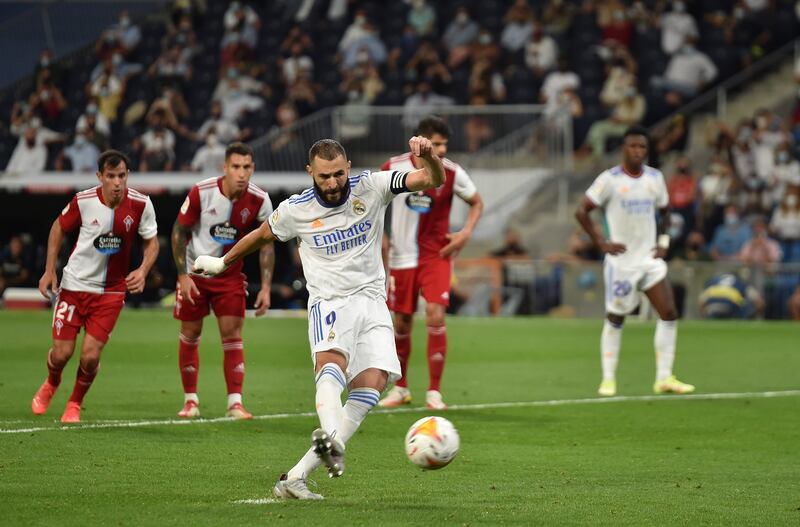 Karim Benzema of Real Madrid scores their team's fifth goal from the penalty spot in a 5-2 win over Celta Vigo. Getty Images