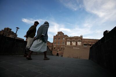 Yemenis walk through a pedestrian bridge in the old city of Sanaa earlier this month. EPA