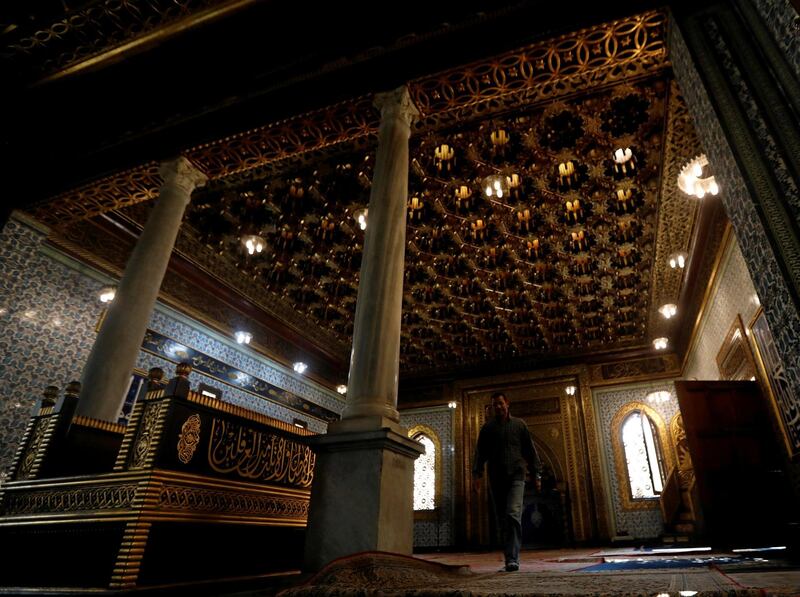 A visitor walks in the mosque at the Manial Palace and Museum in Cairo, Egypt. Reuters