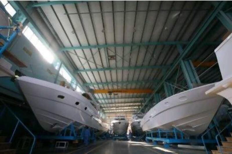 Smooth sailing: yachts at Gulf Craft's manufacturing plant in Umm Al Quwain. Jeffrey E Biteng / The National