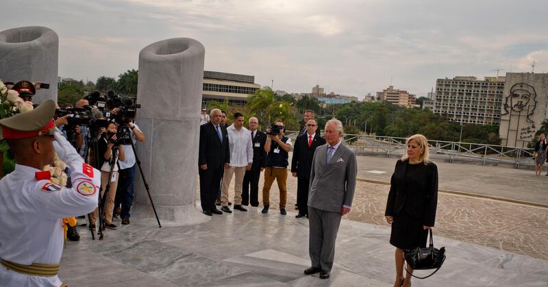 Prince Charles, Prince of Wales, and Ana Teresita Gonzalez, Cuba's deputy minister of foreign affairs, at the Jose Marti Monument in Havana, Cuba. AP