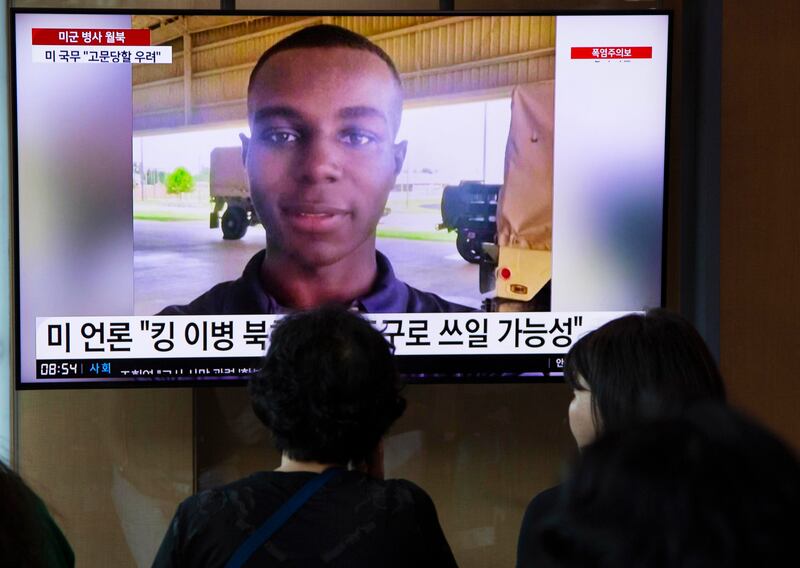 People watch a news report on missing US soldier Pte Travis King at a station in Seoul, South Korea, on July 22. EPA