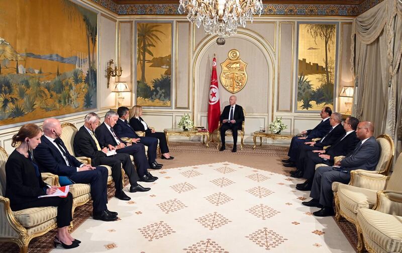 Tunisian President Kais Saied, centre, welcomes French Interior Minister Gerald Darmanin, fifth from left, and German Interior Minister Nancy Faeser, sixth from left, to the presidential palace in Carthage, in June. EPA