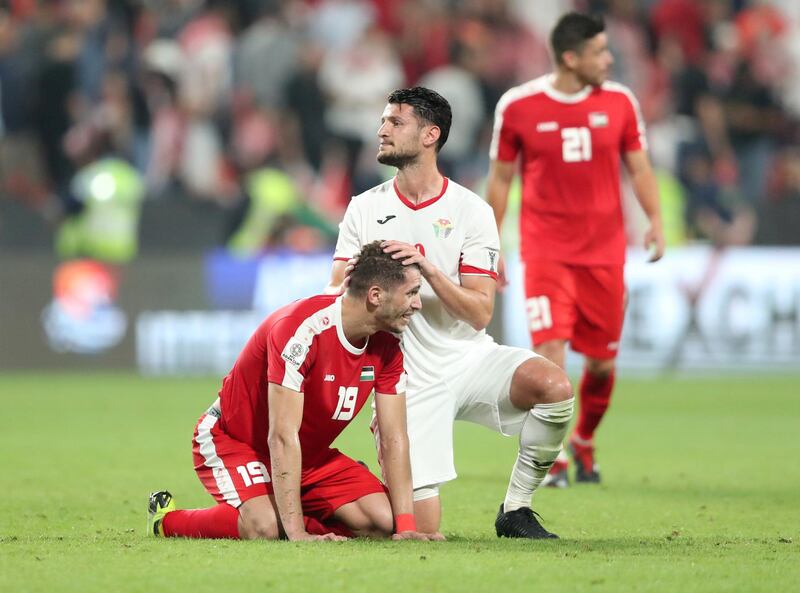 Palestine's Mahmoud Wadi reacts after the match with Jordan's Anas Bani Yassen. Reuters