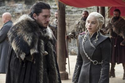 This image released by HBO shows Kit Harington, left, and Emilia Clarke on the season finale of "Game of Thrones." The series set yet another audience record Sunday with its seventh-season finale. Nielsen says an all-time high of 12.1 million viewers were tuned in to the wildly popular fantasy drama. An additional 4 million caught the episode on streaming channels. (Macall B. Polay/HBO via AP)