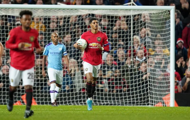 Marcus Rashford carries the ball back to the centre circle after scoring for Manchester United in the second half. AP