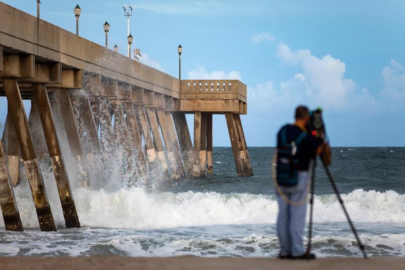 Wind and waves begin to build at Johnny Mercer's Fishing Pier in Wrighstville Beach, North Carolina. EPA