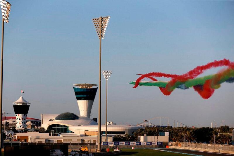 The Emirates Knights team decorates the Yas Marina Circuit before the Formula One race begins. Jorge Ferrari / Wam