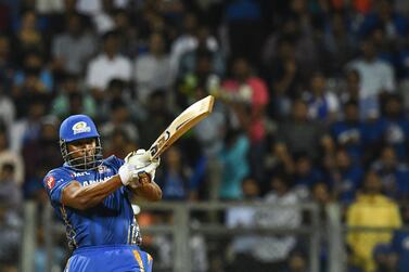 Mumbai Indians cricketer Kieron Pollard plays a shot during the 2019 Indian Premier League (IPL) Twenty20 cricket match between Mumbai Indians and Kings XI Punjab at the Wankhede cricket stadium in Mumbai, on April 10, 2019. (Photo by Indranil MUKHERJEE / AFP) / ----IMAGE RESTRICTED TO EDITORIAL USE - STRICTLY NO COMMERCIAL USE----- / GETTYOUT