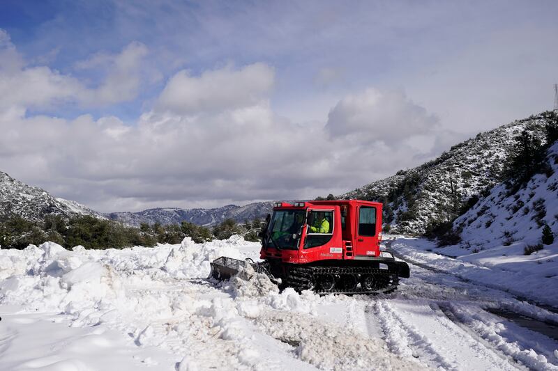 Emergency crews are scrambling to shuttle food and medicine to residents of California mountain communities stranded by back-to-back winter storms. AP