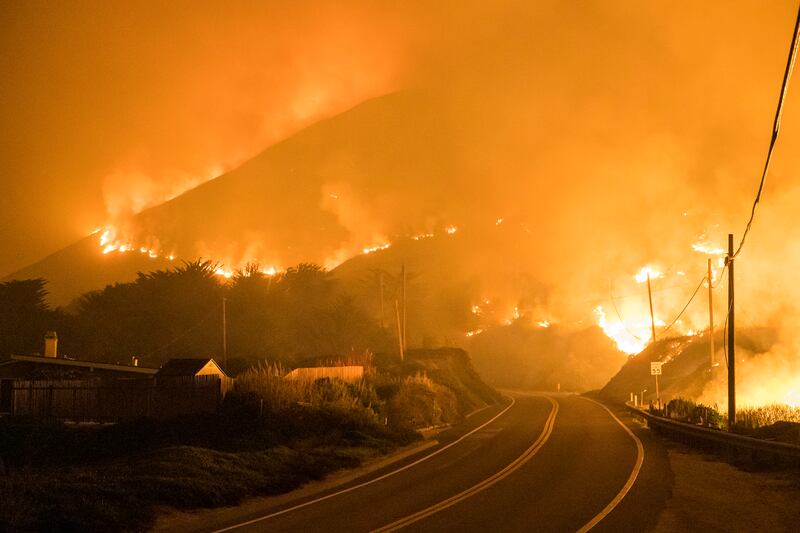 The Colorado Fire burns along Highway 1 near Big Sur, Calif. , Saturday, Jan.  22, 2022.  (AP Photo / Nic Coury)