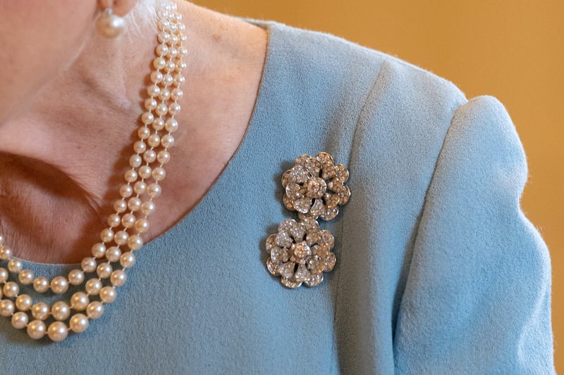 The Nizam of Hyderabad rose brooches worn by Queen Elizabeth II during a reception in Sandringham House, in February 2022.