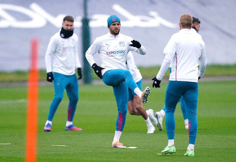 Manchester City's Kyle Walker, centre, during a training session at the City Football Academy. PA