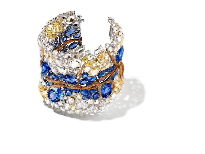Reflection Bangle: This cuff is made up of 1,881 gemstones in total, weighing in at  321.79 carats.