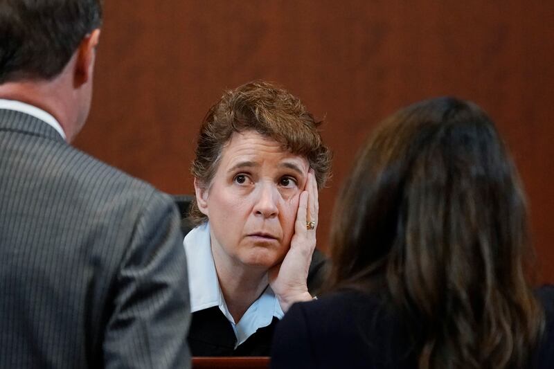 Judge Penney Azcarate talks to lawyers during bench conference at the Fairfax County Circuit Courthouse in Fairfax, Virginia, where the defamation trial brought by actor Johnny Depp against his ex-wife Amber Heard continues on May 16, 2022. AP